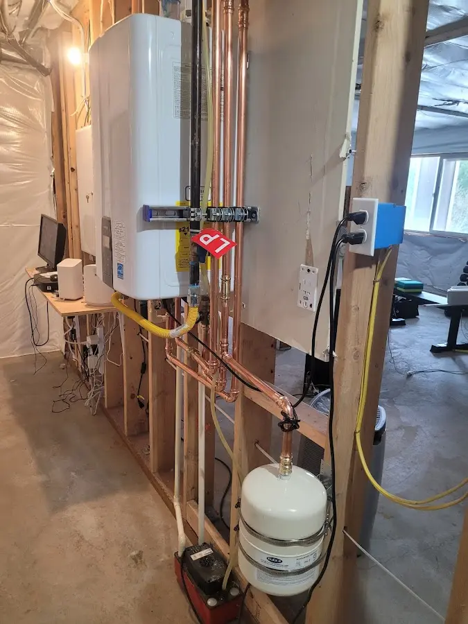 Licensed plumber repairing a kitchen sink in Chamblee